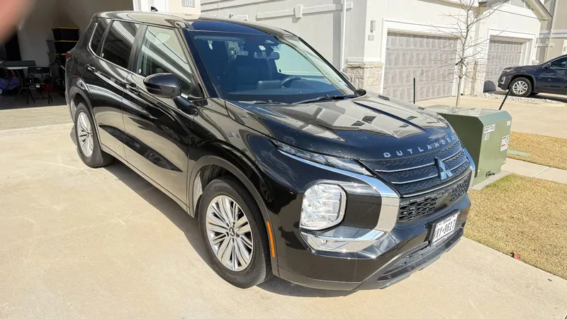 Front view of the black Mitsubishi Outlander SUV